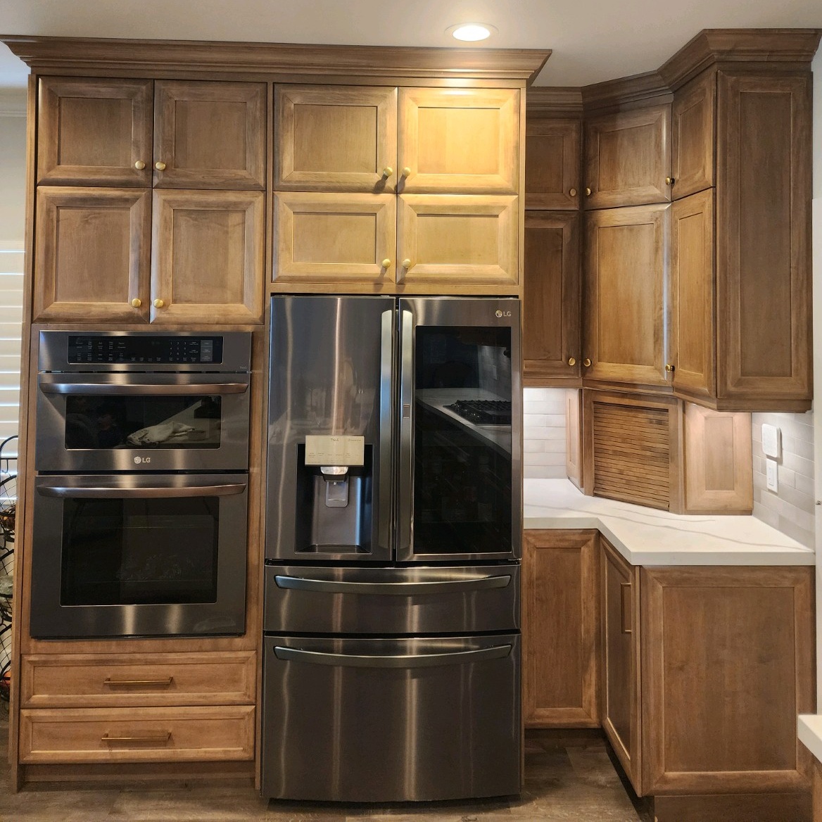 custom corner kitchen built by all pro builders - built in fridge