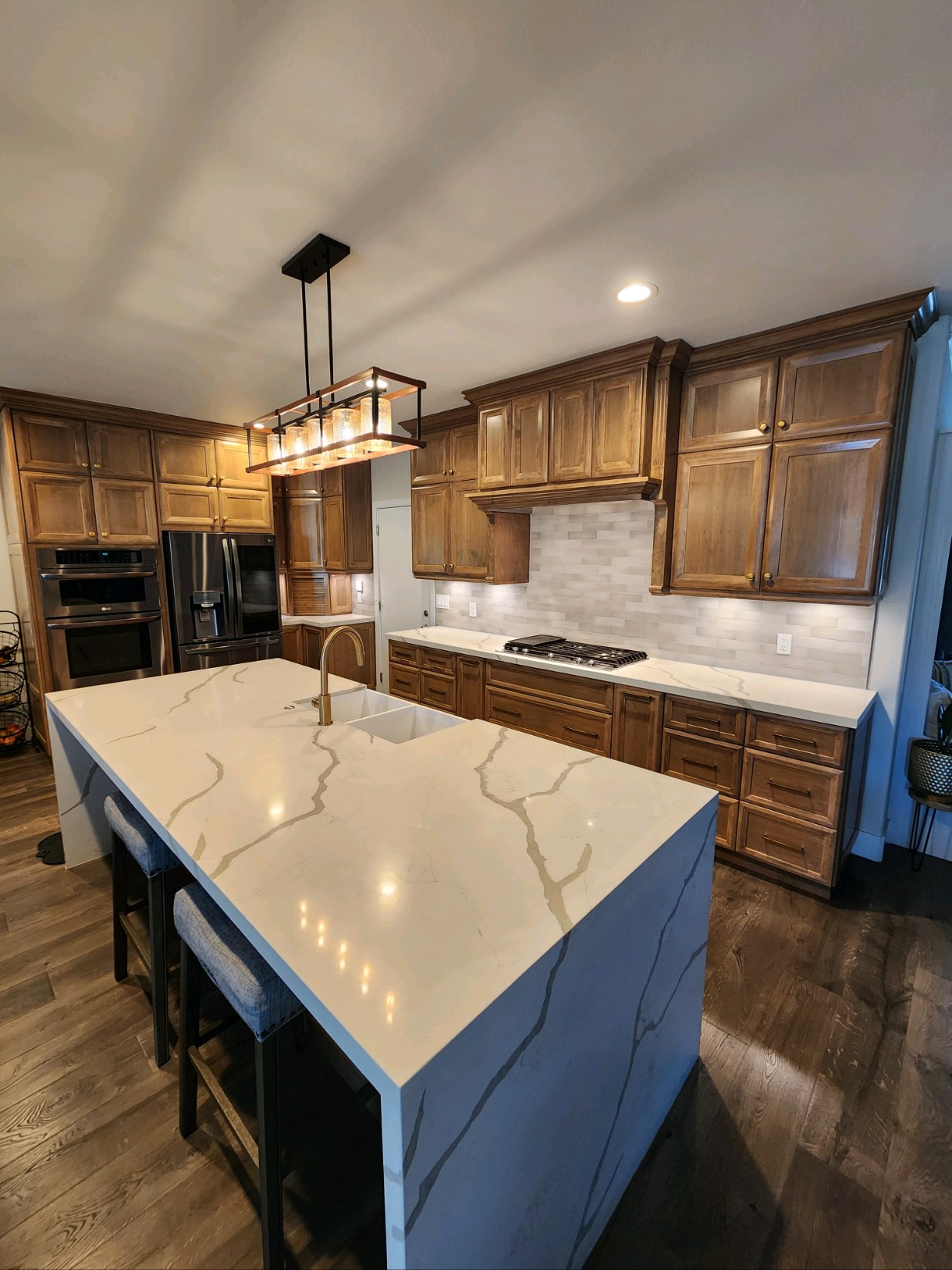 a kitchen renovation done by all pro builders - marble island - lightbox