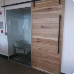 sliding wooden door built by all pro builders - lightbox