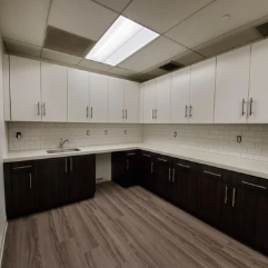 custom cabinets and counter by all pro builders - long L shape - lightbox