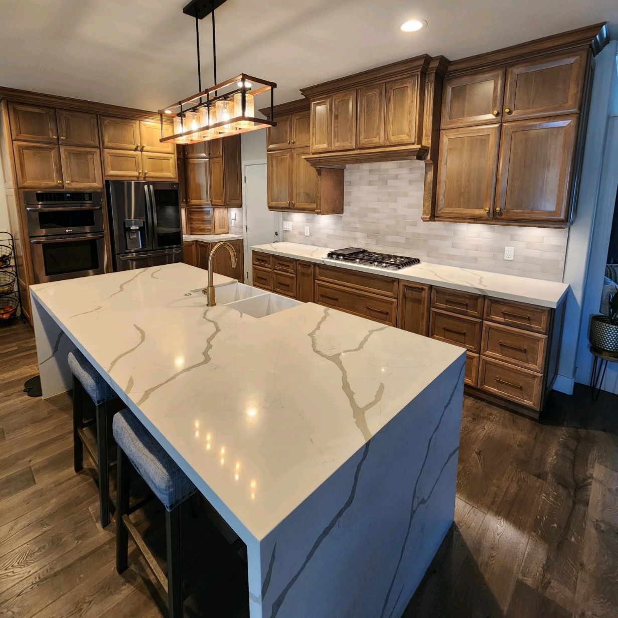 a kitchen renovation done by all pro builders - marble island 
