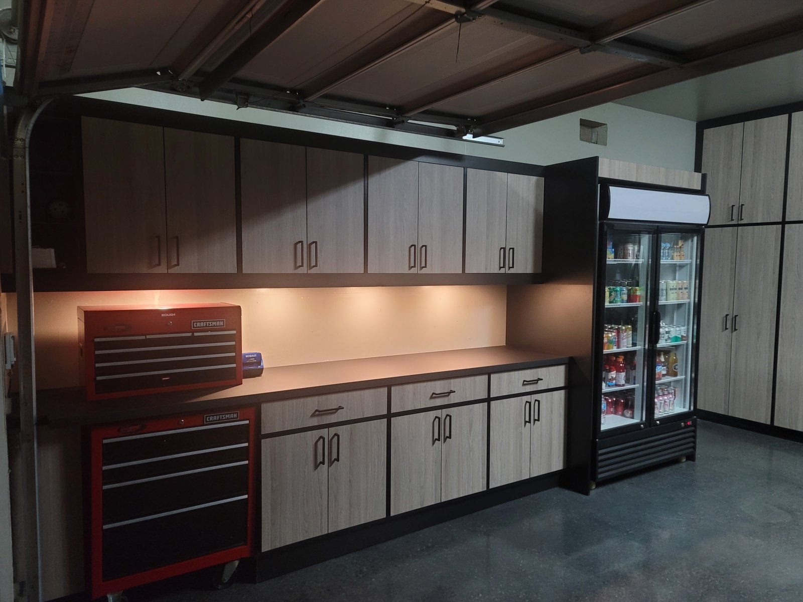 Garage remodel with custom cabinets by All Pro Premium Builders Inc